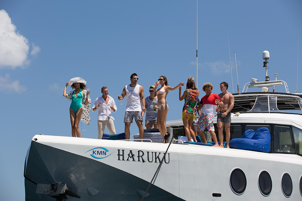 Image description: People partying on boat