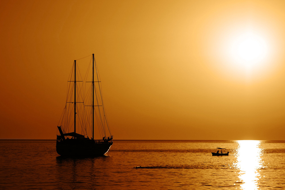 Image description: Boat at sunset