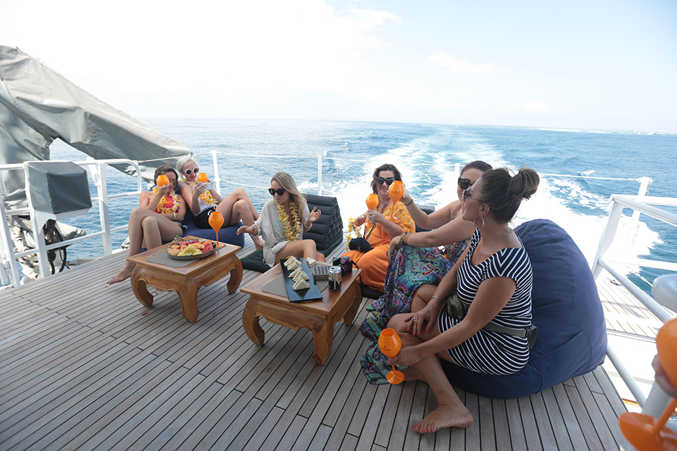 Image description: People on deck of boat